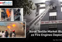 Surat Textile Market Blaze: 22 Fire Engines Deployed Massive fire engulfs Surat Textile Market with thick smoke rising, while fire engines and firefighters work to control the blaze