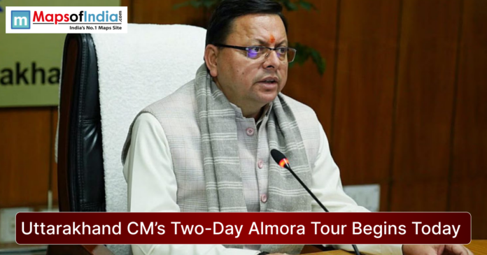 Uttarakhand Chief Minister seated at a desk during an official meeting, speaking into a microphone, with the headline “Uttarakhand CM’s Two-Day Almora Tour Begins Today” and Maps of India logo displayed.