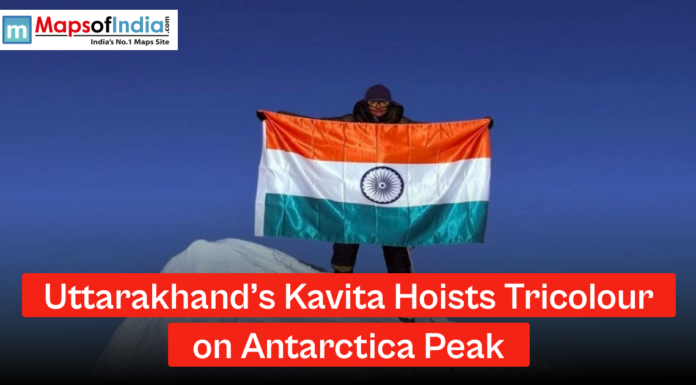 Uttarakhand’s Kavita Hoists Tricolour on Antarctica Peak A woman standing on a snowy Antarctic peak holding the Indian national flag, with a headline reading “Uttarakhand’s Kavita Hoists Tricolour on Antarctica Peak” and Maps of India logo.