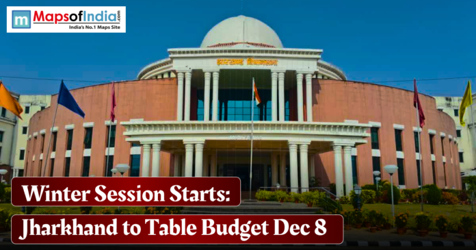 Front view of the Jharkhand Legislative Assembly building with flags flying, overlaid text reading “Winter Session Starts: Jharkhand to Table Budget Dec 8.”