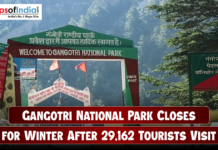 Gangotri National Park Closes for Winter After 29,162 Tourists Visit Entrance gate of Gangotri National Park surrounded by dense green forests and mountains, with a headline overlay stating “Gangotri National Park Closes for Winter After 29,162 Tourists Visit,” and the Maps of India logo at the top left corner.