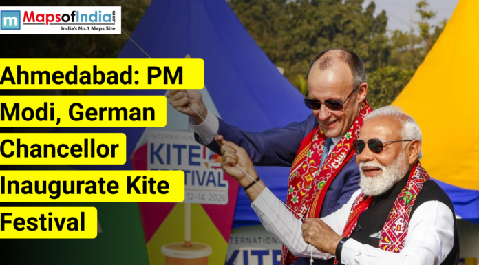 Ahmedabad: PM Modi, German Chancellor Inaugurate Kite Festival Two political leaders flying kites at an outdoor event in Ahmedabad, with colorful kites in the background and on-image text announcing the inauguration of a kite festival, alongside the Maps of India logo.