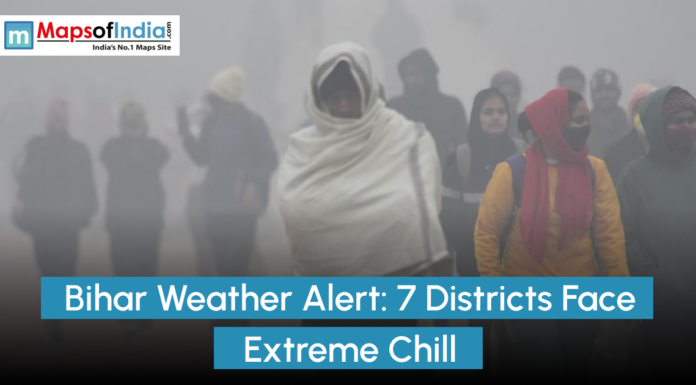 Bihar Weather Alert: 7 Districts Face Extreme Chill People wrapped in shawls and winter clothing walking through dense fog in Bihar, illustrating a weather alert as seven districts face extreme cold and reduced visibility, branded by MapsofIndia.com.