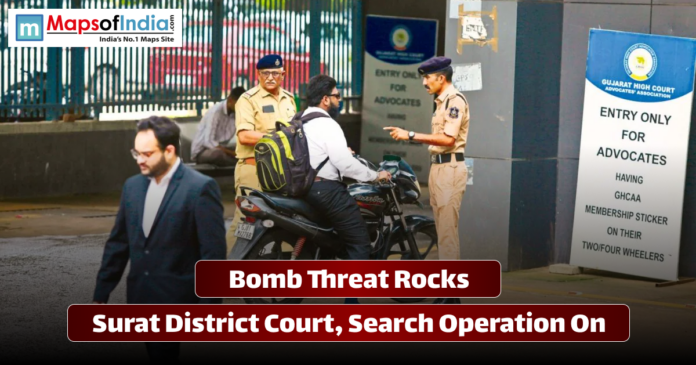 Police checking vehicles and people outside Surat District Court after a bomb threat, with security heightened and a search operation underway.