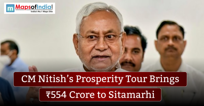 Close-up of Bihar Chief Minister Nitish Kumar speaking, with a banner reading “CM Nitish’s Prosperity Tour Brings ₹554 Crore to Sitamarhi” and the MapsofIndia logo in the corner.