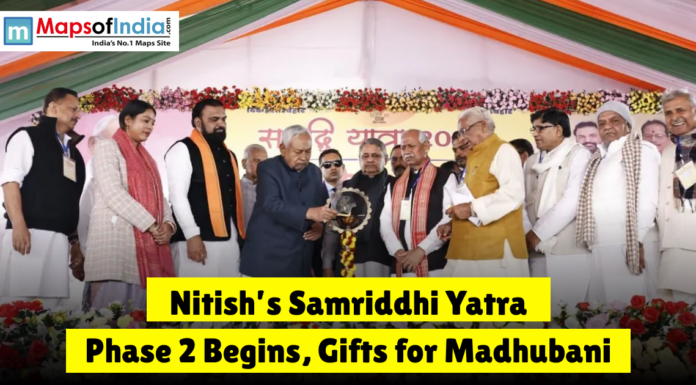 Nitish’s Samriddhi Yatra Phase 2 Begins, Gifts for Madhubani Nitish Kumar reviewing development projects at a stall with a text overlay reading "Nitish's Samriddhi Yatra: CM Nitish Kumar to visit Madhubani today for Phase 2."
