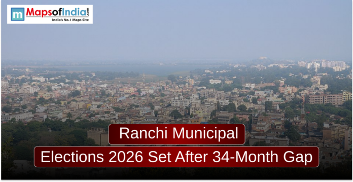 An aerial cityscape view of Ranchi under a hazy sky, featuring a mix of low-rise buildings and greenery. A dark red banner in the foreground reads, 