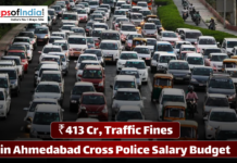 ₹413 Cr, Traffic Fines in Ahmedabad Cross Police Salary Budget Aerial view of a congested city road filled with multiple lanes of cars and auto-rickshaws, accompanied by text stating that ₹413 crore in traffic fines in Ahmedabad has crossed the police salary budget