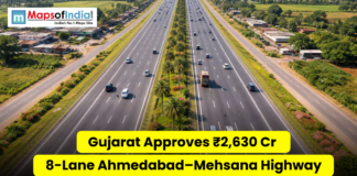 Gujarat Approves ₹2,630 Cr 8-Lane Ahmedabad–Mehsana Highway Aerial view of a wide multi-lane highway in Gujarat with vehicles and greenery, overlaid with text “Gujarat Approves ₹2,630 Cr 8-Lane Ahmedabad–Mehsana Highway” and Maps of India logo