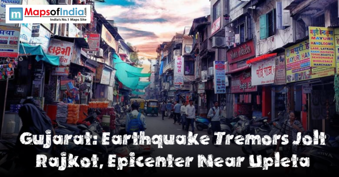 gujarat (9) Busy street market in Rajkot, Gujarat, with shops, pedestrians, motorcycles, and signboards lining a narrow road, featuring a headline that reads ‘Gujarat: Earthquake Tremors Jolt Rajkot, Epicenter Near Upleta.’