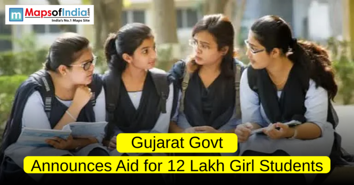 Group of schoolgirls in uniform sitting together and discussing their studies, representing the Gujarat government’s announcement of financial aid for 12 lakh girl students.