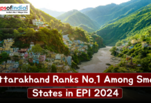 Uttarakhand Ranks No.1 Among Small States in EPI 2024 Scenic view of Uttarakhand’s hilly landscape with a river and hillside towns, featuring text stating “Uttarakhand Ranks No.1 Among Small States in EPI 2024.”