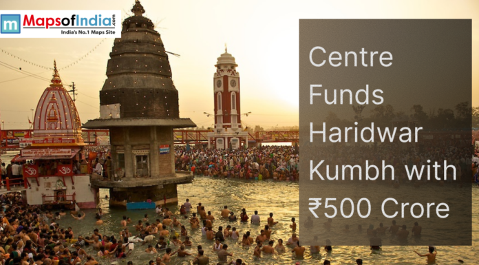 Centre Funds Haridwar Kumbh with ₹500 Crore Devotees bathing in the Ganga at Haridwar during Kumbh Mela, with temples and clock tower in the background and text about ₹500 crore central funding