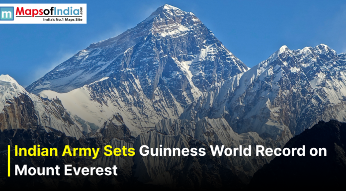 Indian Army Sets Guinness World Record on Mount Everest Indian Army sets a Guinness World Record on Mount Everest, with a clear view of the snow-covered Everest peak under a blue sky.