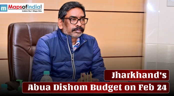 Jharkhand’s Abua Dishom Budget on Feb 24 A man seated at an office desk during a meeting, with text overlay reading “Jharkhand’s Abua Dishom Budget on Feb 24.