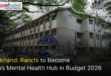 Jharkhand: Ranchi to Become India’s Mental Health Hub in Budget 2026 The NIMHANS Emergency Service Block building with street traffic and text regarding Ranchi's 2026 mental health budget.
