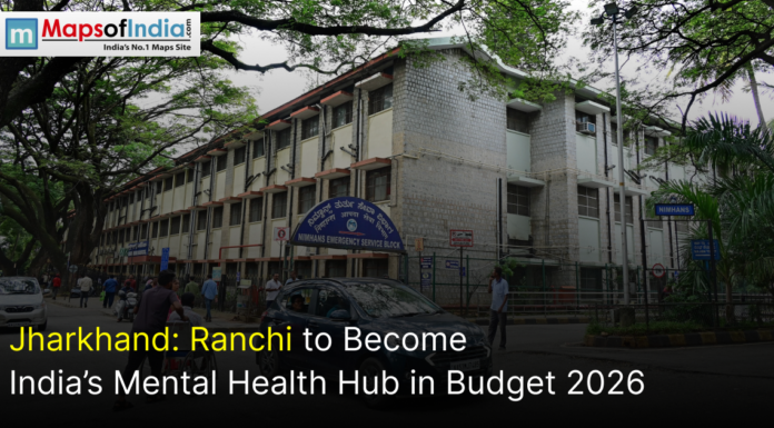 Jharkhand: Ranchi to Become India’s Mental Health Hub in Budget 2026 The NIMHANS Emergency Service Block building with street traffic and text regarding Ranchi's 2026 mental health budget.