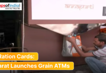 No Ration Cards: Gujarat Launches Grain ATMs Man collecting a bag of food grains from an Annapurti grain ATM machine in Gujarat, highlighting the launch of ration-free distribution.