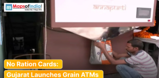 No Ration Cards: Gujarat Launches Grain ATMs Man collecting a bag of food grains from an Annapurti grain ATM machine in Gujarat, highlighting the launch of ration-free distribution.
