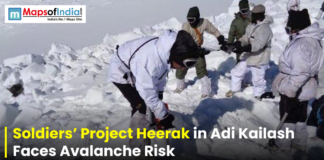 Soldiers’ Project Heerak in Adi Kailash Faces Avalanche Risk Soldiers in snow gear working together in a snowy mountainous area, with text overlay about Project Heerak in Adi Kailash facing avalanche risk