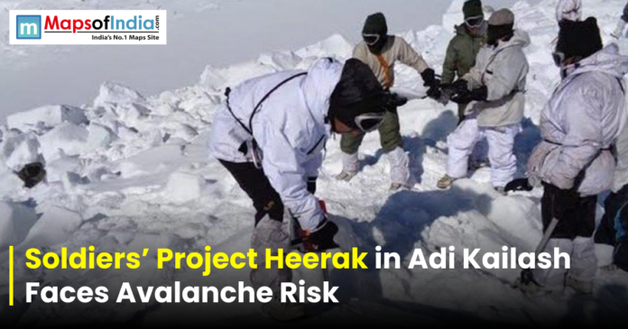 Soldiers(1) Soldiers in snow gear working together in a snowy mountainous area, with text overlay about Project Heerak in Adi Kailash facing avalanche risk