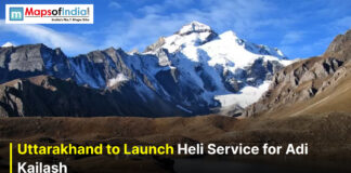 Uttarakhand to Launch Heli Service for Adi Kailash Snow-capped Adi Kailash peak in Uttarakhand under a clear blue sky with text overlay reading “Uttarakhand to Launch Heli Service for Adi Kailash” and Maps of India logo in the corner.