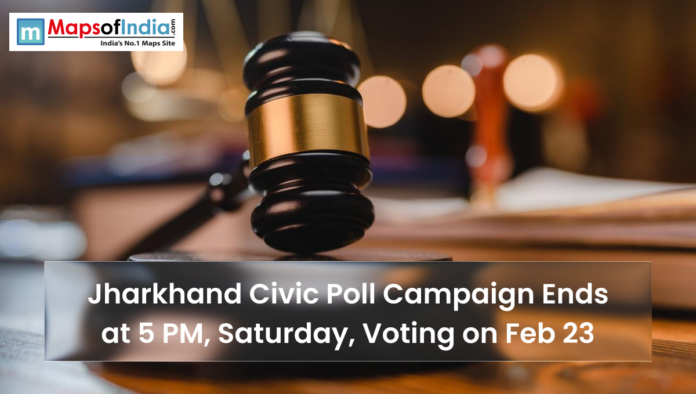 Gavel on a desk with text overlay reading “Jharkhand Civic Poll Campaign Ends at 5 PM, Saturday, Voting on Feb 23” and Maps of India logo.