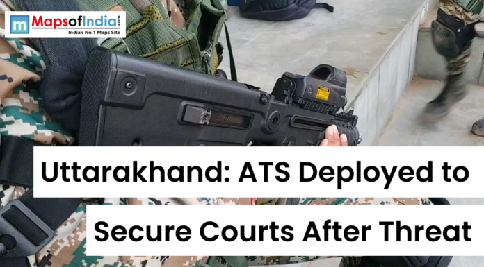 Uttarakhand: ATS Deployed to Secure Courts After Threat Armed security personnel with rifle and text overlay reading “Uttarakhand: ATS Deployed to Secure Courts After Threat” with Maps of India logo.
