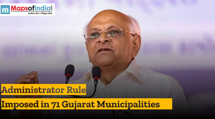 Administrator Rule Imposed in 71 Gujarat Municipalities Political leader speaking at a podium during an announcement about administrator rule imposed in 71 Gujarat municipalities
