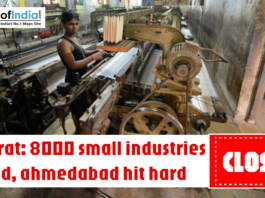 Worker operating textile machinery in a small factory with headline about 8000 small industries closed in Gujarat