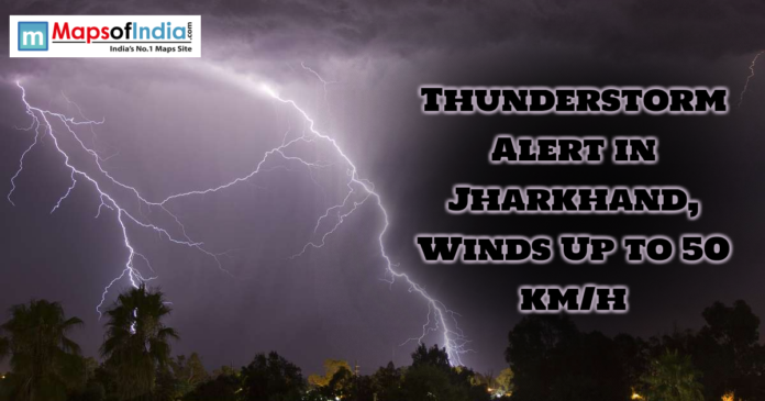 Lightning flashes across a dark sky during a thunderstorm as a warning message reads “Thunderstorm Alert in Jharkhand, Winds Up to 50 km/h.”