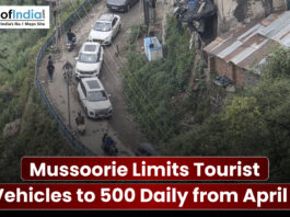 Traffic congestion on a narrow hill road in Mussoorie with headline about limiting tourist vehicles to 500 per day from April 1.