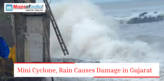 Mini Cyclone, Rain Causes Damage in Gujarat Large sea waves crashing near a coastal structure with text about mini cyclone and rain damage in Gujarat.