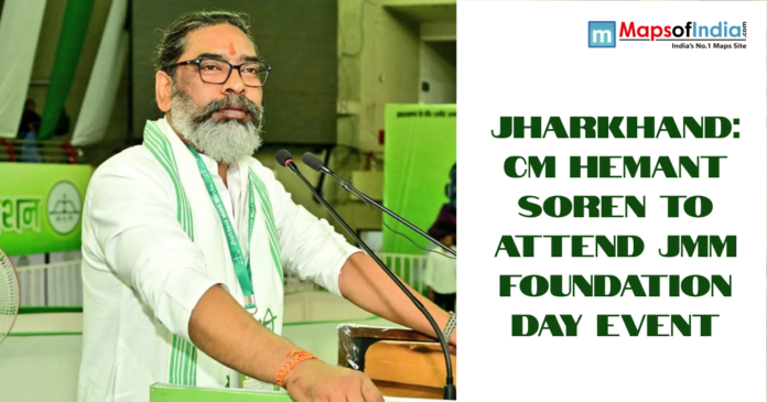 Hemant Soren speaking at a podium during a JMM Foundation Day event in Jharkhand, with green-themed backdrop and Maps of India branding.