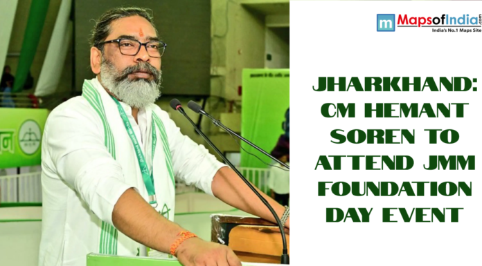 Jharkhand: CM Hemant Soren to Attend JMM Foundation Day Event Hemant Soren speaking at a podium during a JMM Foundation Day event in Jharkhand, with green-themed backdrop and Maps of India branding.