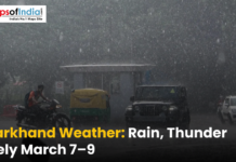 Jharkhand Weather: Rain, Thunder Likely March 7–9 A weather news graphic showing vehicles, including a motorcycle, an auto-rickshaw, and cars, navigating a road during a heavy downpour. Text at the bottom reads, "Jharkhand Weather: Rain, Thunder Likely March 7–9," with the Maps of India logo in the top left corner