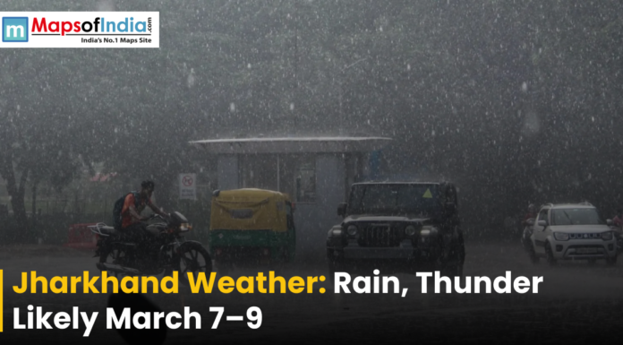 Jharkhand Weather: Rain, Thunder Likely March 7–9 A weather news graphic showing vehicles, including a motorcycle, an auto-rickshaw, and cars, navigating a road during a heavy downpour. Text at the bottom reads, "Jharkhand Weather: Rain, Thunder Likely March 7–9," with the Maps of India logo in the top left corner