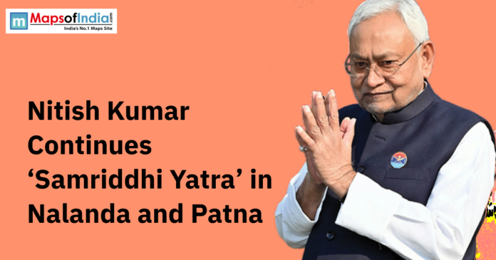 nitish kumar Poster featuring Nitish Kumar with folded hands and text about his ‘Samriddhi Yatra’ in Nalanda and Patna