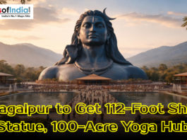 A massive 112-foot black statue of Lord Shiva overlooking a landscaped plaza and mountains, with text announcing a new yoga hub in Bhagalpur.