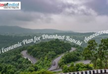 New Economic Plan for Dhanbad-Ranchi Announced Scenic winding road through lush green hills between Dhanbad and Ranchi under cloudy skies highlighting regional landscape