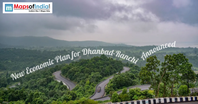 Scenic winding road through lush green hills between Dhanbad and Ranchi under cloudy skies highlighting regional landscape