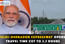 Delhi–Dehradun Expressway Opens, Travel Time Cut to 2.5 Hours Narendra Modi next to a Delhi-Dehradun Expressway sign.