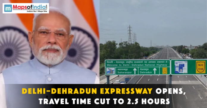 Narendra Modi next to a Delhi-Dehradun Expressway sign.