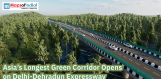 Asia’s Longest Green Corridor Opens on Delhi-Dehradun Expressway Aerial view of the Delhi-Dehradun Expressway passing through dense forest, highlighting Asia’s longest green corridor with vehicles on a modern highway.