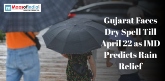 Gujarat Faces Dry Spell Till April 22 as IMD Predicts Rain Relief People carrying umbrellas during rainy weather illustrate Gujarat’s dry spell and forecast of rain relief by IMD.
