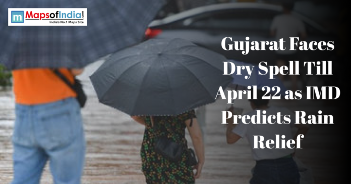 People carrying umbrellas during rainy weather illustrate Gujarat’s dry spell and forecast of rain relief by IMD.