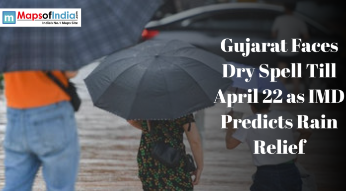 Gujarat Faces Dry Spell Till April 22 as IMD Predicts Rain Relief People carrying umbrellas during rainy weather illustrate Gujarat’s dry spell and forecast of rain relief by IMD.