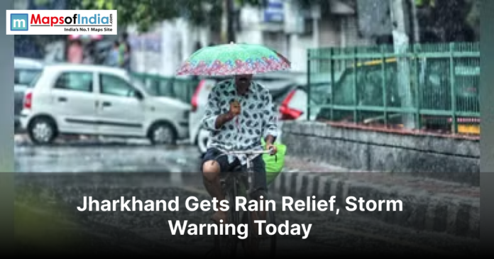Man cycling in rain with umbrella under headline Jharkhand Gets Rain Relief.