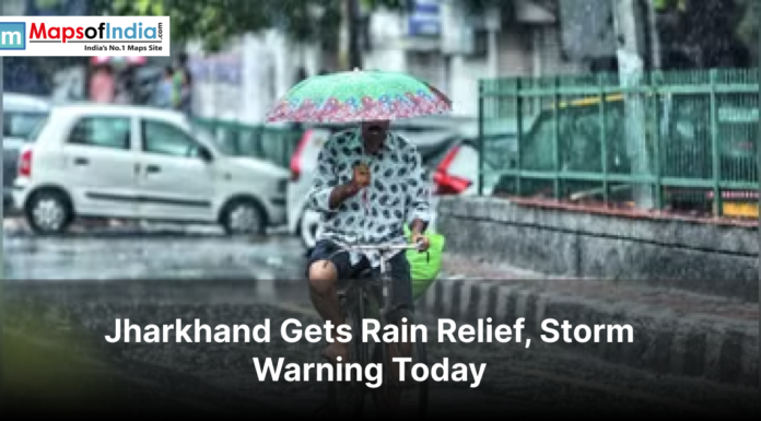 Jharkhand Gets Rain Relief, Storm Warning Today Man cycling in rain with umbrella under headline Jharkhand Gets Rain Relief.