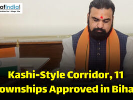 A government official in Bihar signing documents related to approval of a Kashi-style corridor and new townships